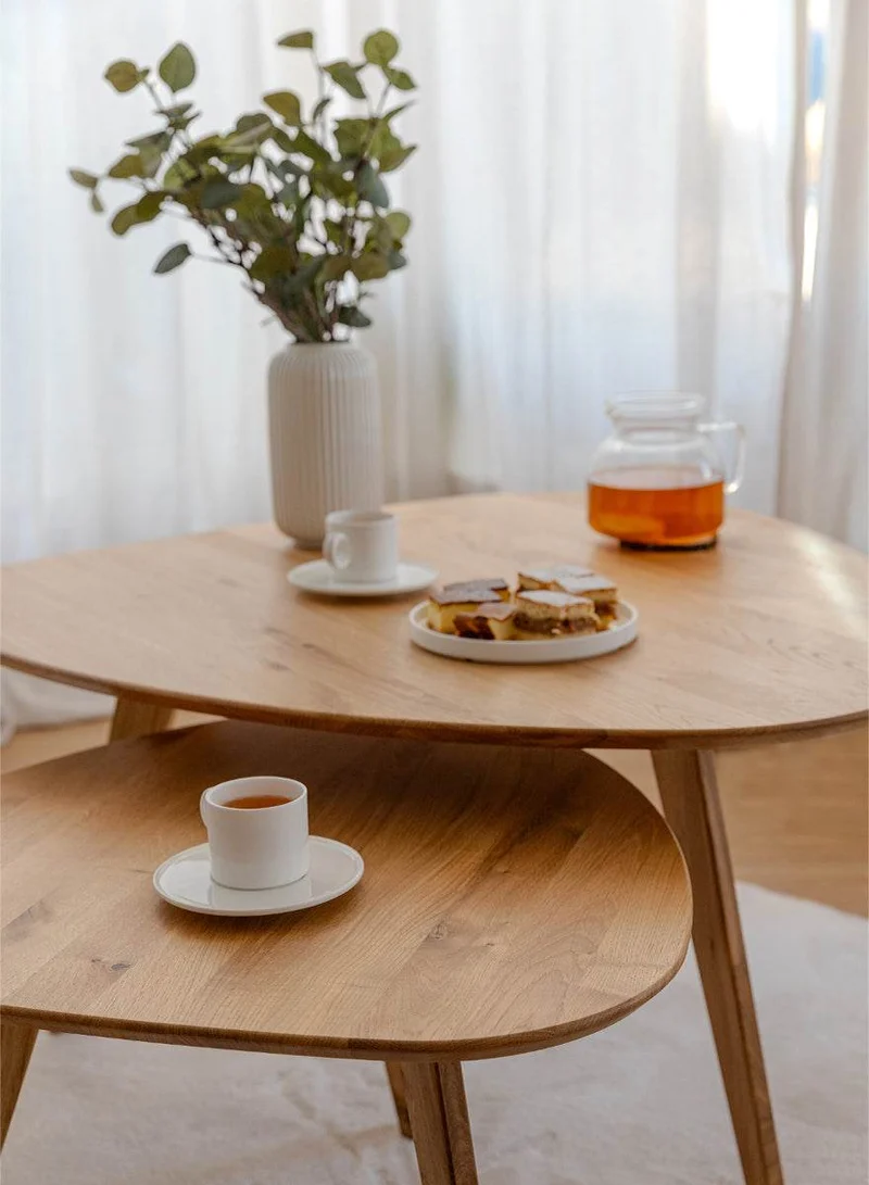 Minimalistischer Couchtisch aus massiver Eiche | Ovaler Beistelltisch Orbetello in zwei Größen