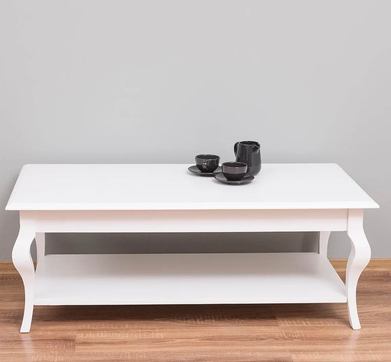 Couchtisch aus Massivholz mit geschwungenen Beinen