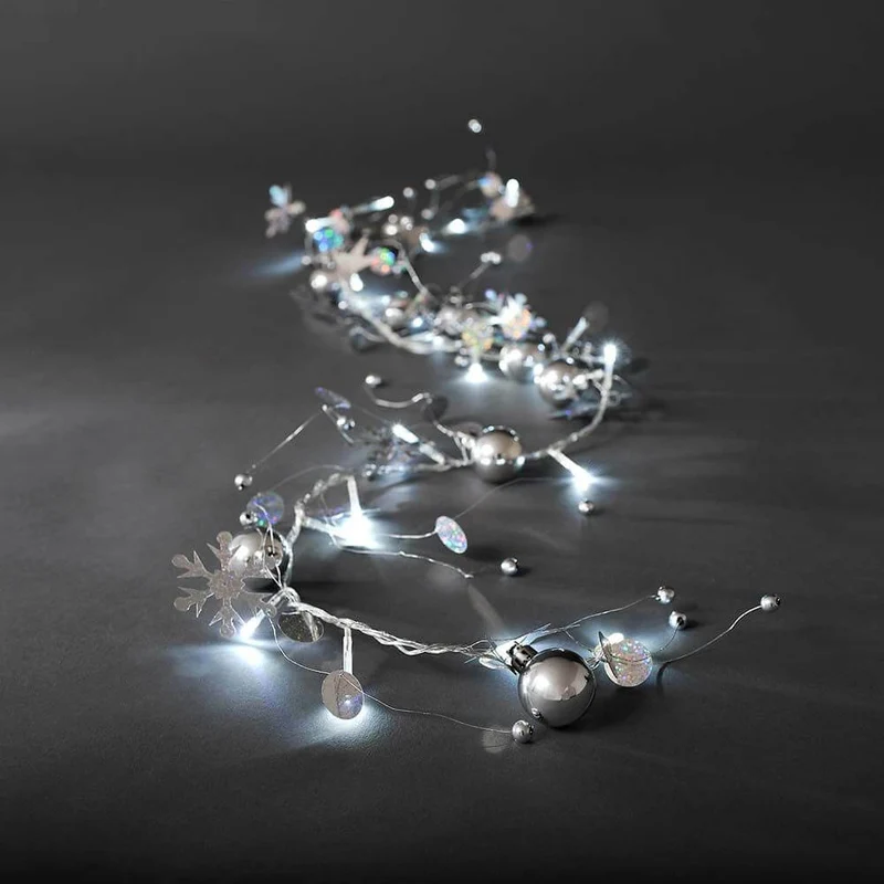 LED Dekolichterkette silberfarbene Perlen und Schneekristalle 20 Kaltweiße Dioden